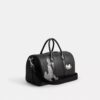 Torba Disney X Coach Compass 35 z Pluto