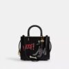 Torba Disney X Coach Rogue 25 z Pluto