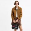 Torba Disney X Coach Rogue 25 z Pluto