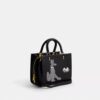 Torba Disney X Coach Rogue 25 z Pluto