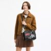 Torba Disney X Coach Rogue 25 z Pluto