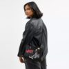 Torba Disney X Coach Rogue 25 z Pluto