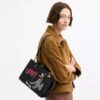 Torba Disney X Coach Rogue 25 z Pluto