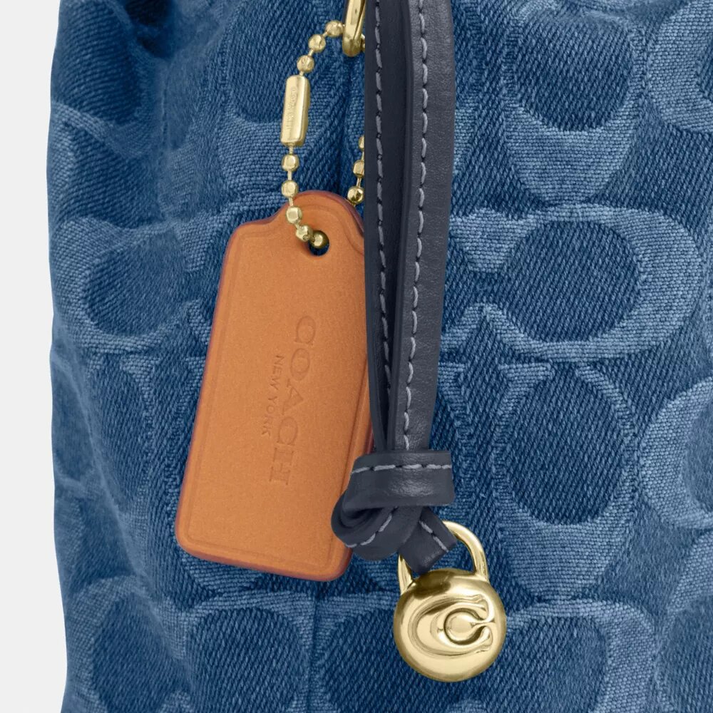 Torba Faye Mini ze sznurkiem w charakterystycznym dżinsie