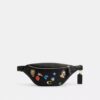 Torba na pasek Disney X Coach Charter 7 z nadrukiem naklejek