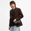 Torba na ramię Disney X Coach Charter Slim z nadrukiem naklejek