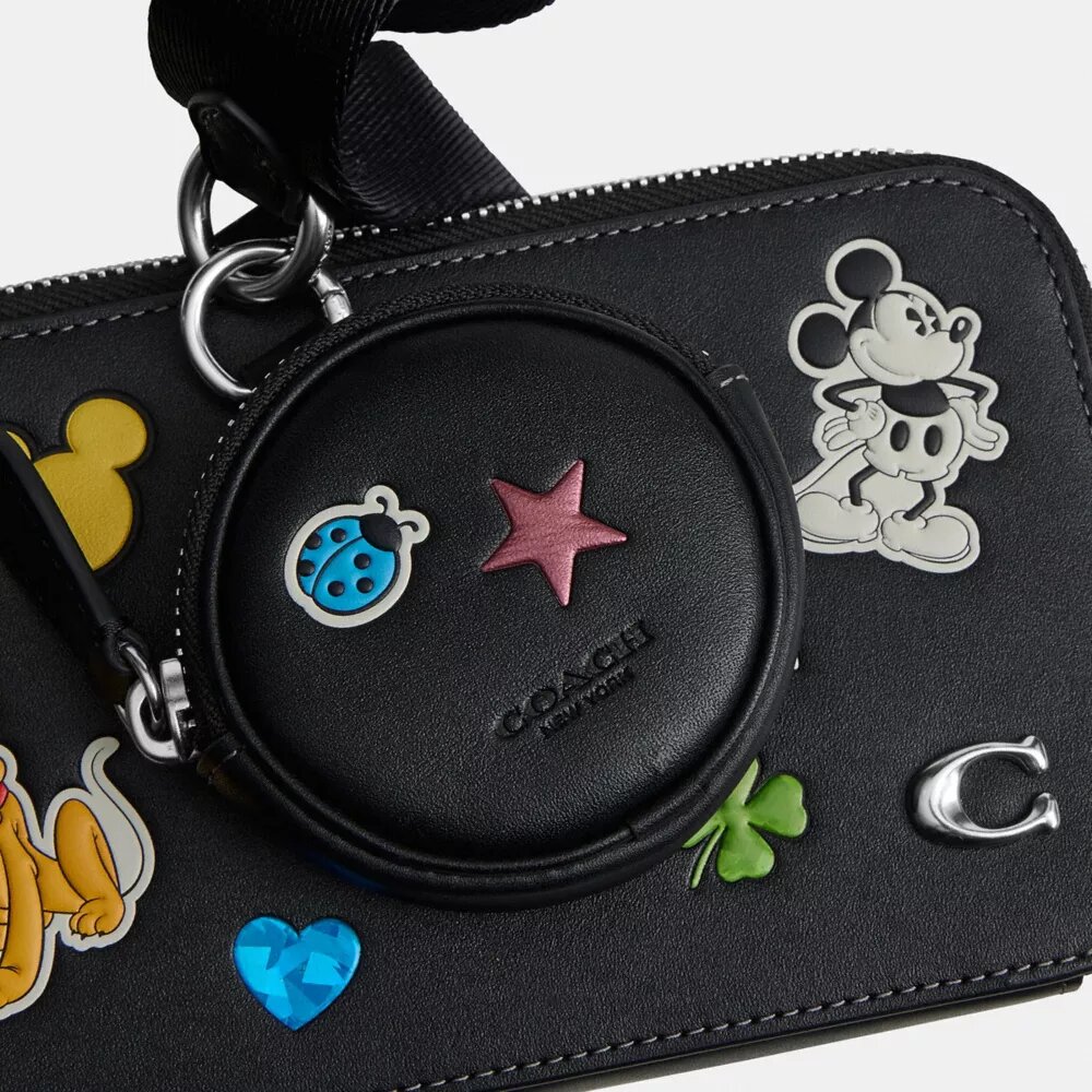 Torba na ramię Disney X Coach Charter Slim z nadrukiem naklejek