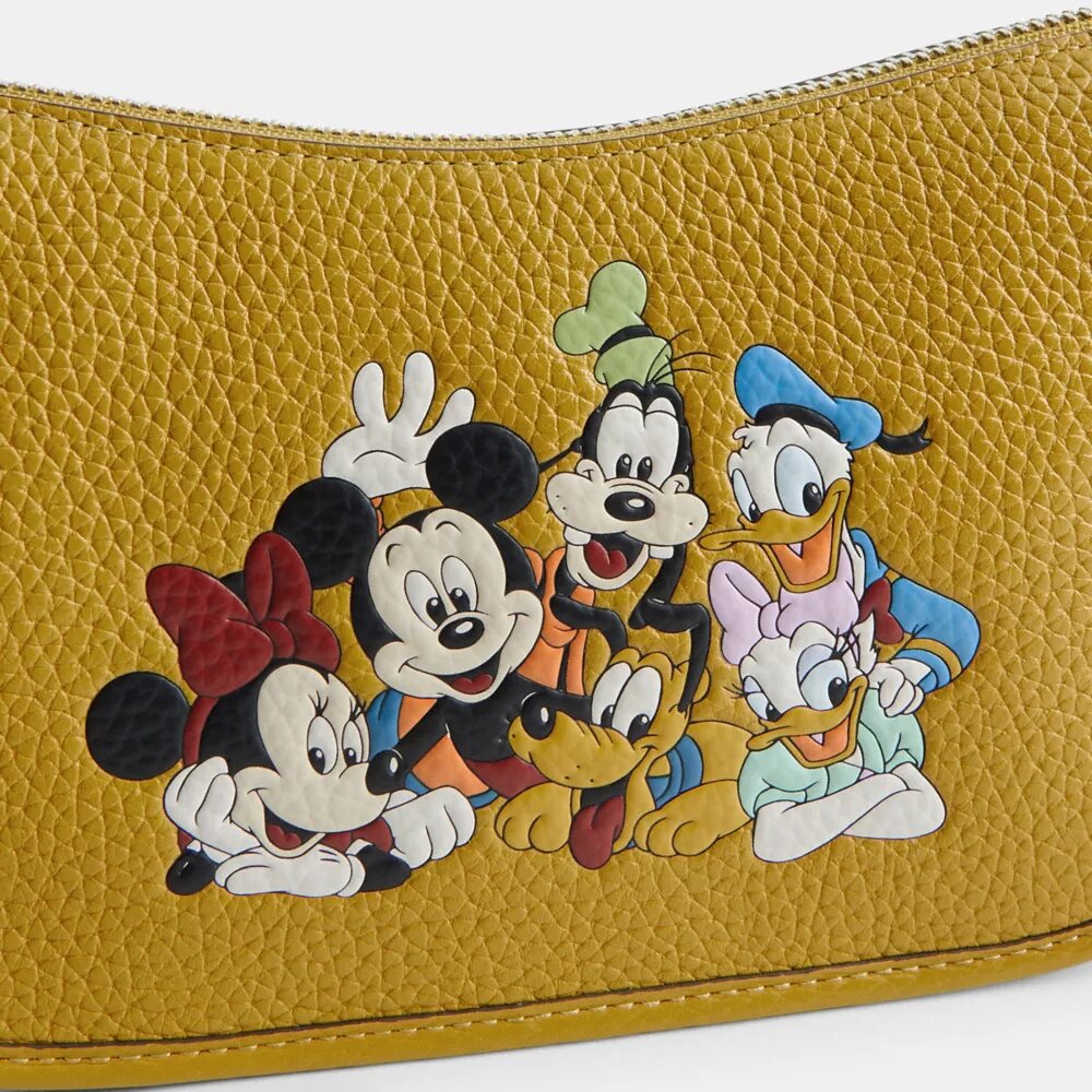Torba Swinger z kolekcji Disney X Coach z regenerowanej skóry z Myszką Miki i przyjaciółmi
