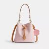 Torba typu bucket Rowan z Signature Canvas z zawieszkami