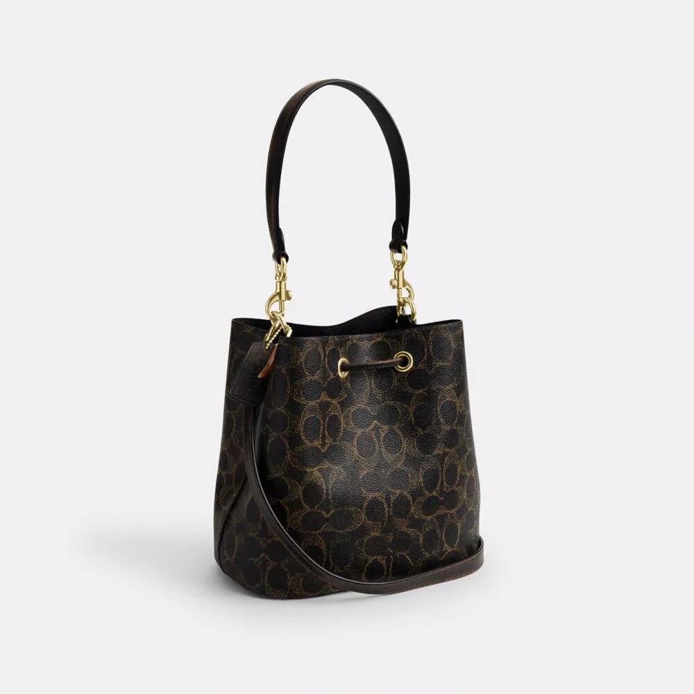 Torba typu bucket Rowan z Signature Canvas z zawieszkami