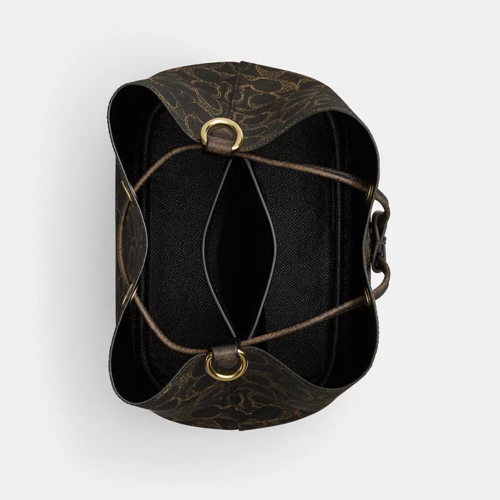Torba typu bucket Rowan z Signature Canvas z zawieszkami