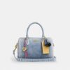 Torba typu satchel Rowan z postarzanego dżinsu z zawieszkami
