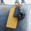 Torba typu satchel Rowan z postarzanego dżinsu z zawieszkami