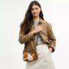 Torebki na ramię Teri z włosia cielęcego z nadrukiem krowim