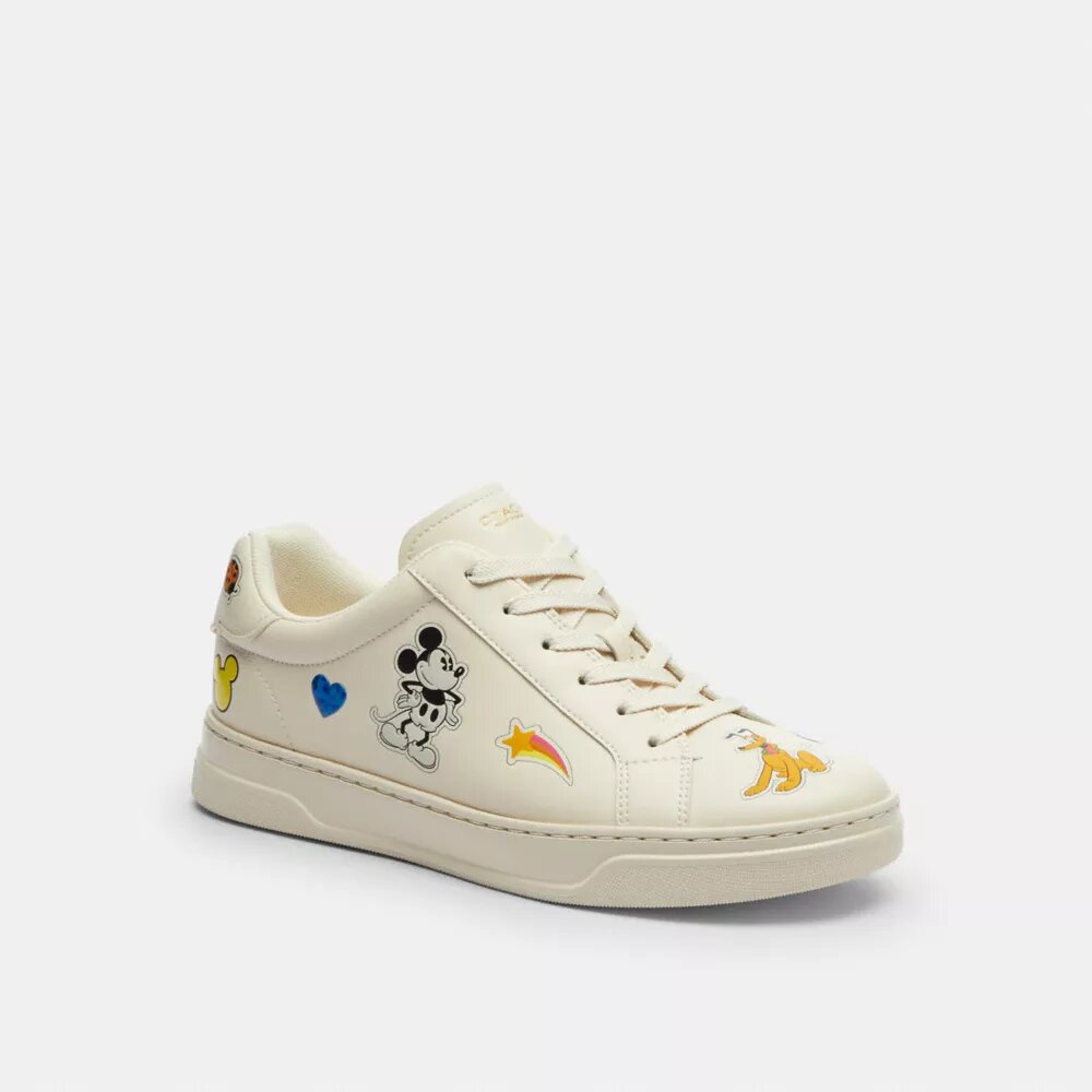 Wysokie sneakersy Disney X Coach z serii High Line z nadrukiem naklejek