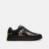 Wysokie sneakersy Disney X Coach z serii High Line z nadrukiem naklejek