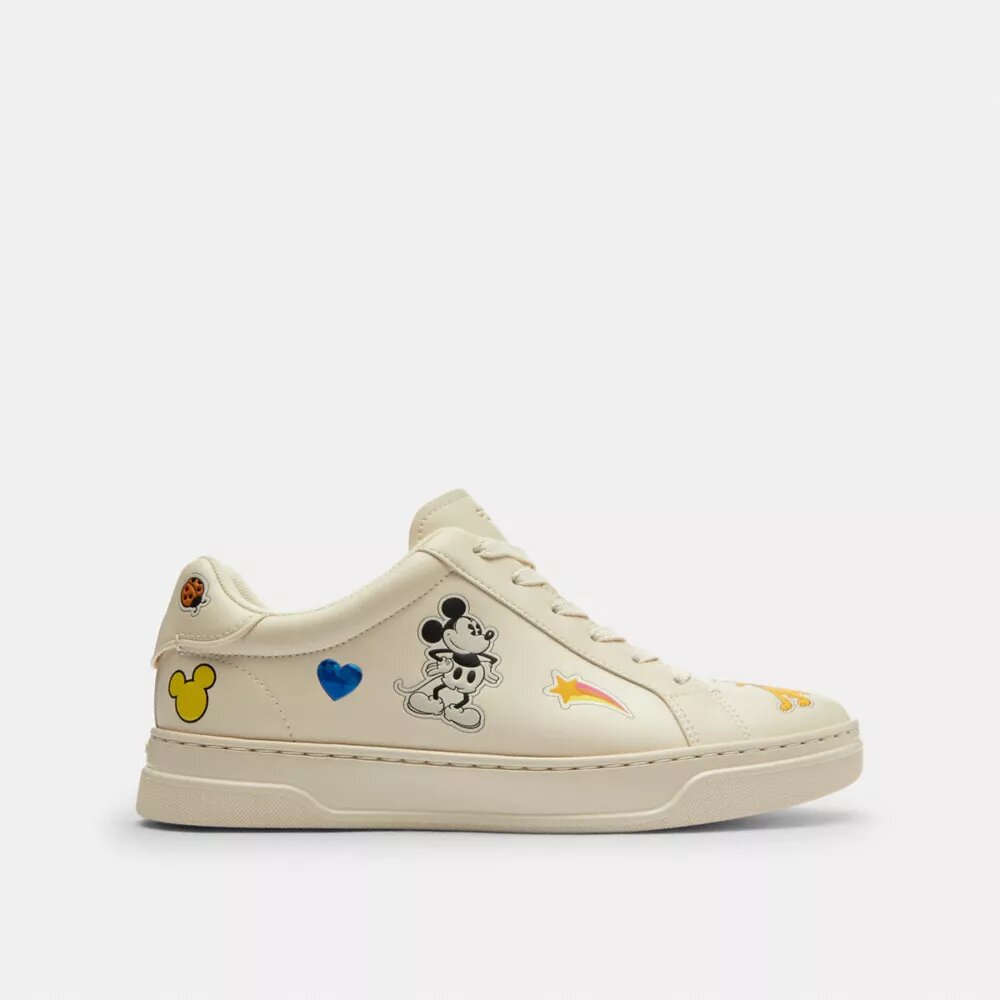 Wysokie sneakersy Disney X Coach z serii High Line z nadrukiem naklejek
