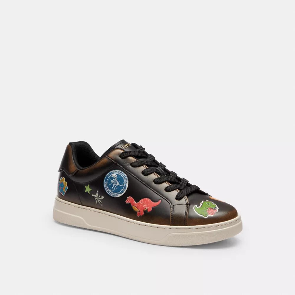 Wysokie sneakersy Rexy z serii High Line z nadrukiem naklejek z okazji 10. urodzin