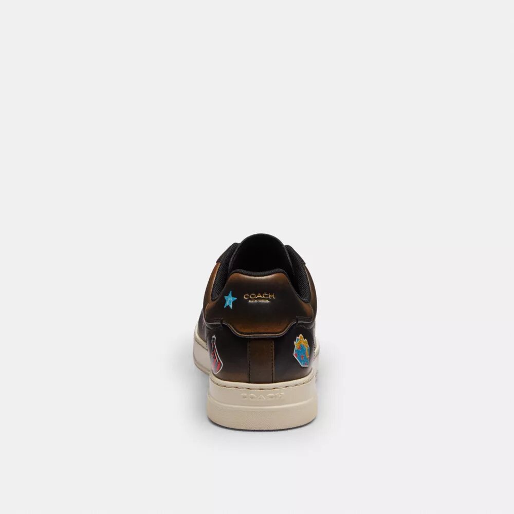 Wysokie sneakersy Rexy z serii High Line z nadrukiem naklejek z okazji 10. urodzin